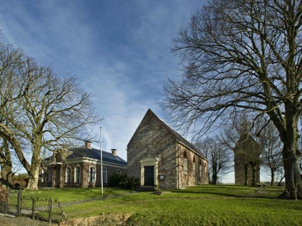 Den Andel kerk en toren landschap